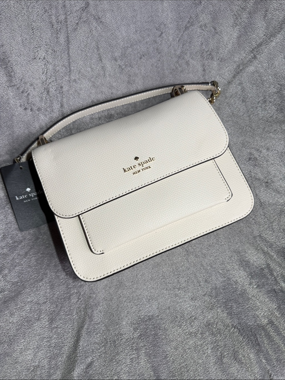 kate spade white pebbled leather flap crossbody with front pocket